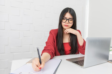 Asian businesswoman work in the modern office.