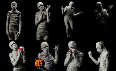 Set of studio shot portrait of young man in costume dressed as cosplay of scary mummy pose in...
