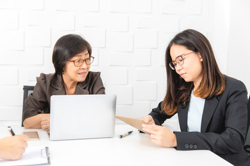 Asian woman working