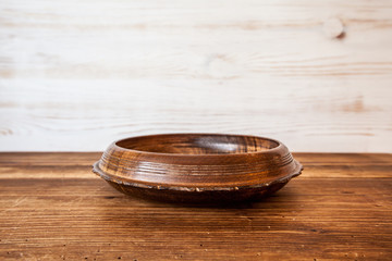 Front view of wooden bowl on rustic table wooden background with Copy Space for Text