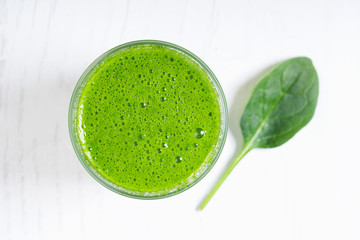 Healthy green smoothie in glass