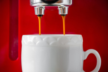 Espresso machine making fresh coffee at home. Closeup, selective focus