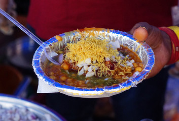 Indian street food vendor make chole bature,Indian fast food 