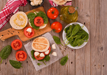 Tigella bread with spinach and tomatoes.