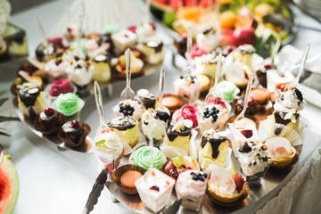 Buffet with a variety of delicious sweets, food ideas, celebration
