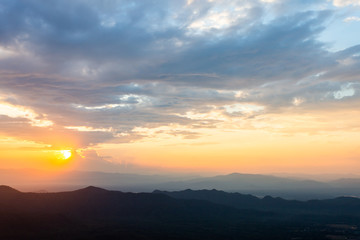 colorful dramatic sky with cloud at sunset.
