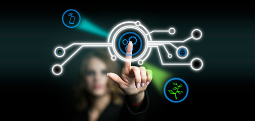 Obraz premium Businesswoman pointing his finger touch virtual icon. Modern digital world concept