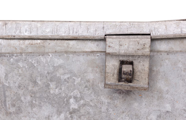 Part of an old metal box isolated on white background