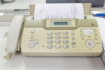 The fax machine for Sending documents in the office concept equipment needed in office