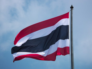 Fototapeta na wymiar The flag of Thailand is blown in the wind.