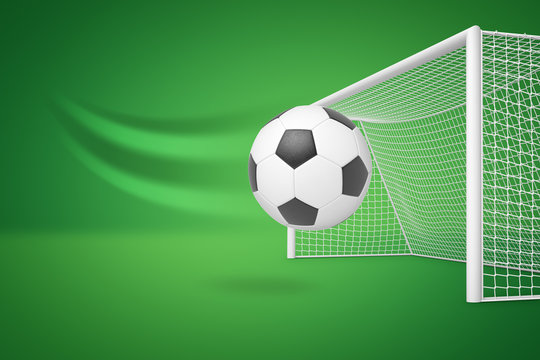 3d rendering of a football hurtling right into the white net on green background.