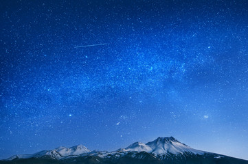 Obraz na płótnie Canvas natural background with snow-covered volcano