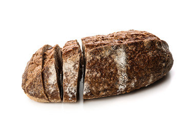 Cut loaf of fresh bread on white background