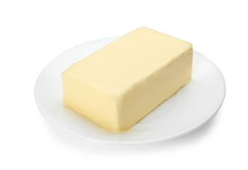 Plate with butter on white background