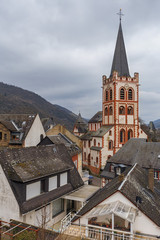 Fototapeta na wymiar Old shingle roofs and a beautiful cathedral is a typical view in the center in the ancient German towns