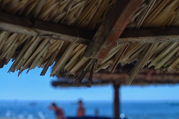 reed umbrellas on Mui Ne beach