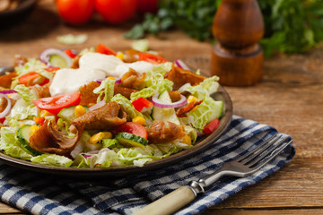 Gyros, kebeb. Salad with mutton and vegetables.