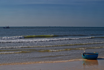 main Vietnamese fishing boat on the sand