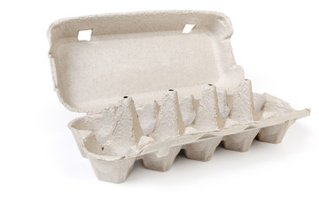 Open empty pulp egg carton on a white background