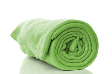 mint green fleece blanket roll on white