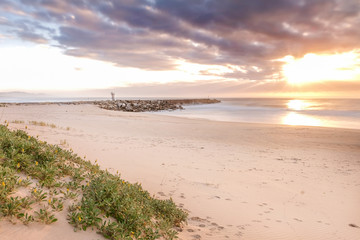 Stunning view of the sunset by the beach
