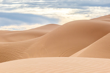 Fototapeta na wymiar The undulating Imperial sand dunes in California