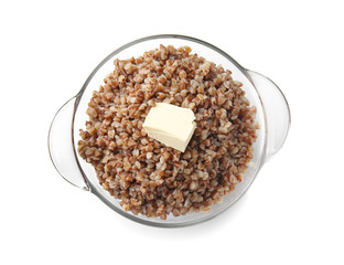 Pot with tasty boiled buckwheat on white background