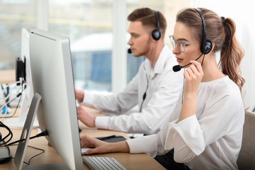 Technical support agents working in office