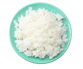 White rice in blue bowl isolated on white background. top view