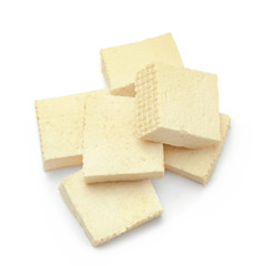 Cut tofu cheese on white background