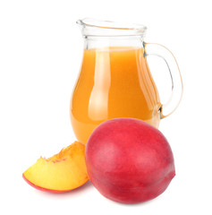 jug of nectarine juice with nectarine fruit and slices isolated on white background.