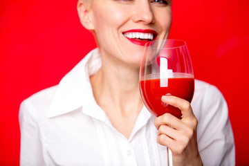 woman with a glass of red tomato juice. Healthy lifestyle concept