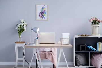 Interior of modern room with comfortable workplace