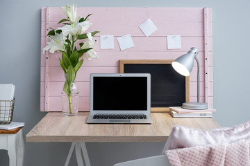 Interior of modern room with comfortable workplace