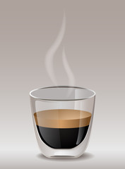 Hot espresso coffee in a transparent mug