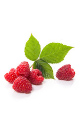 Ripe raspberries with leaf isolated on white background.
