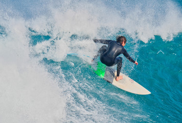 Surfer catching a wave 