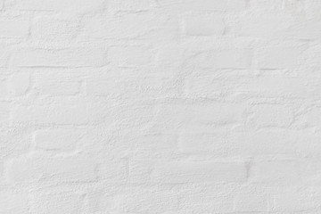 Vintage retro old white brick wall with rough plaster background in detail 