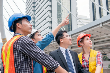 Businessman meeting with engineer team talking progression report project construction