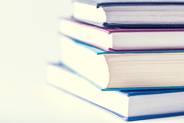 Books collection in pile on background