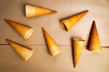 Ice cream cones against beige background