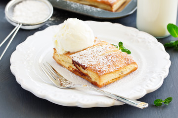 Homemade cakes and puff pastry with apples and caramel.