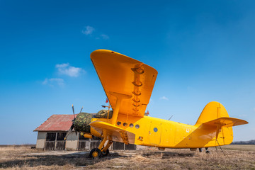 A big old yellow plane