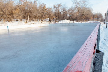 Outdoor empty skating and ice hockery rink