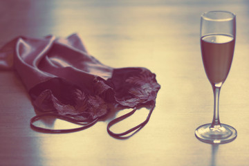 sexy lingerie, high heels and a glass of wine