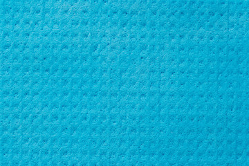 Abstract texture of blue sponge for cleaning.