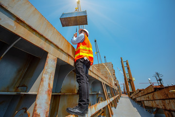stevedore, loading master, port captain or supervisor in charge of command working on board the...