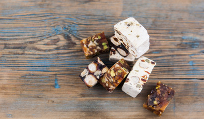 Turkish delight on a dark wood background