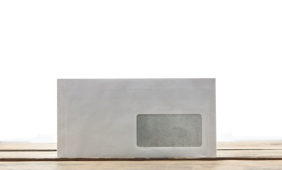 A envelope on wooden background