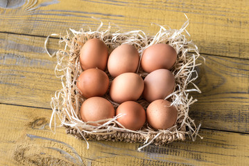 Basket of raw chicken eggs
